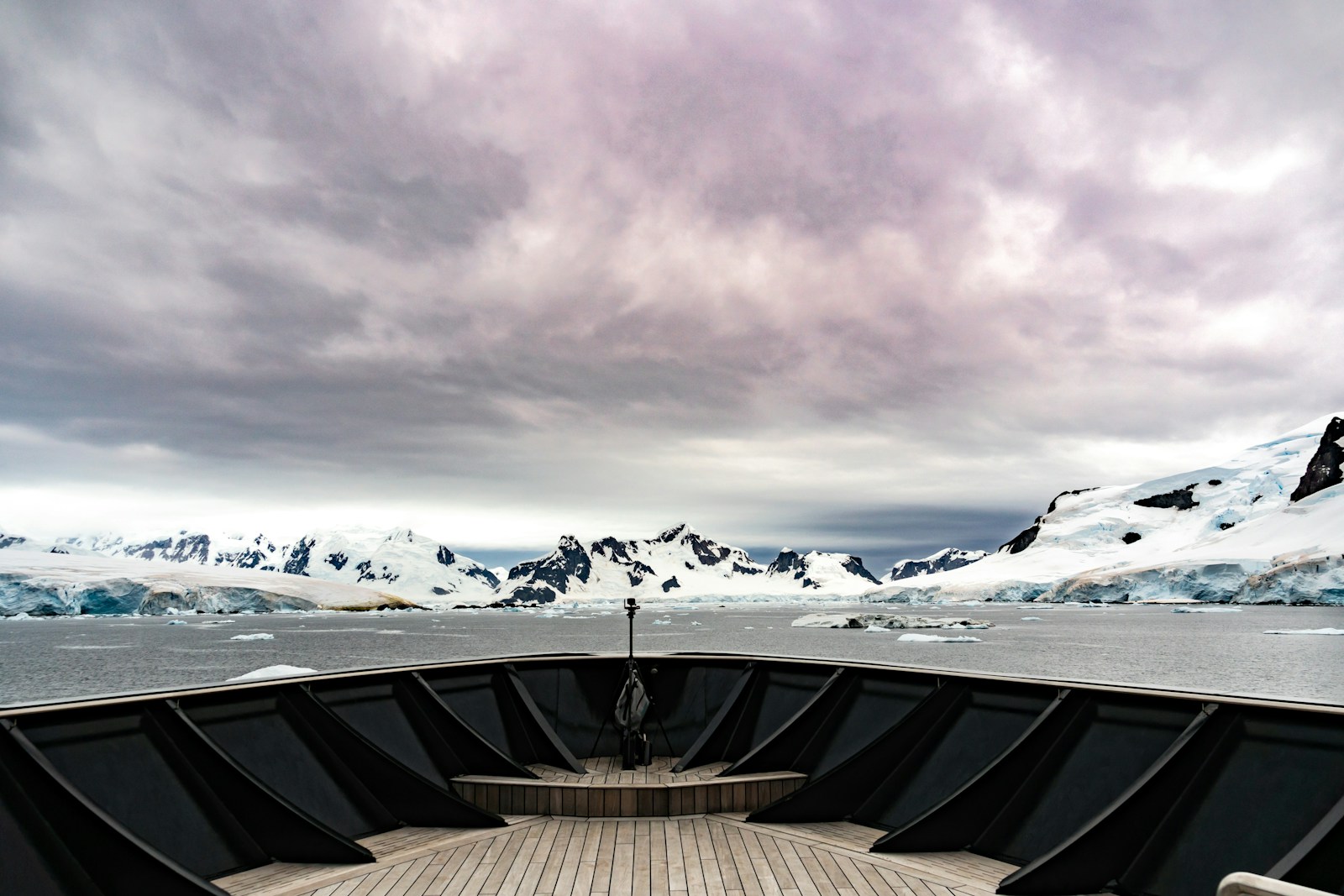 a view from a boat of a mountain range